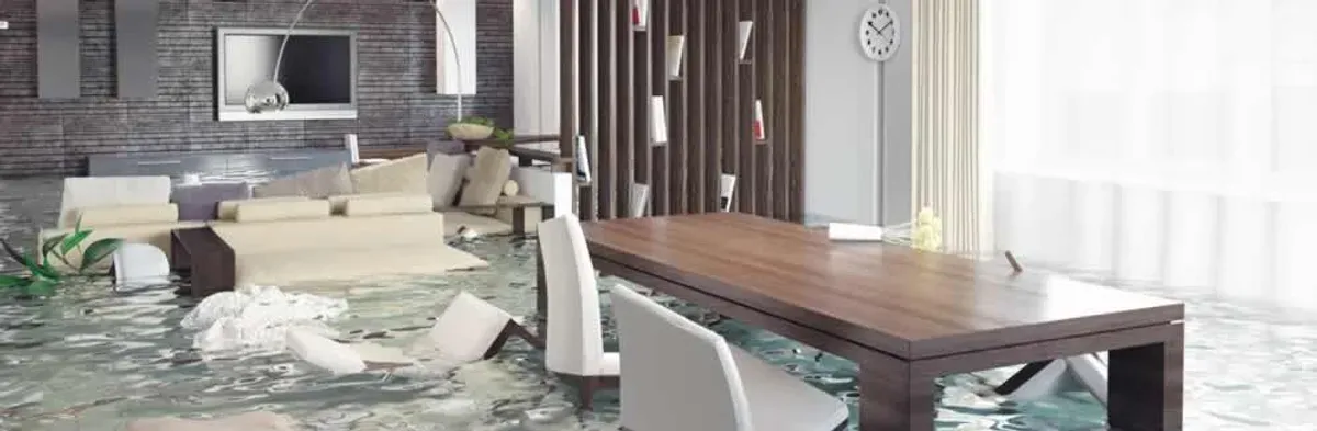 home interior affected by water damage with flooded floors and displaced furniture in San Francisco, CA